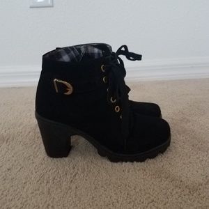 A pair of boots size 38 but runs like a size 37